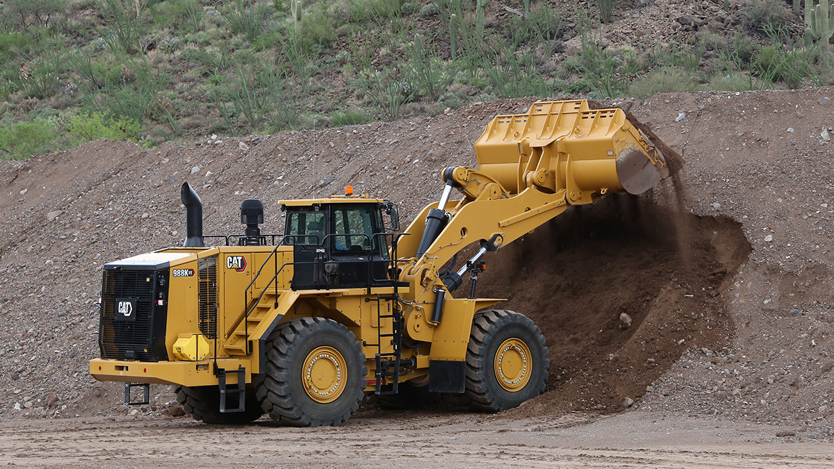 The electric drive Cat 988K XE wheel loader features technology.